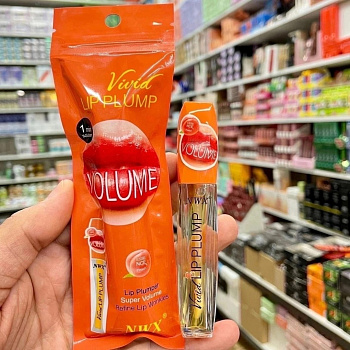 Блеск для увеличения губ с экстрактом персикa Karite Vivid Lip Plump